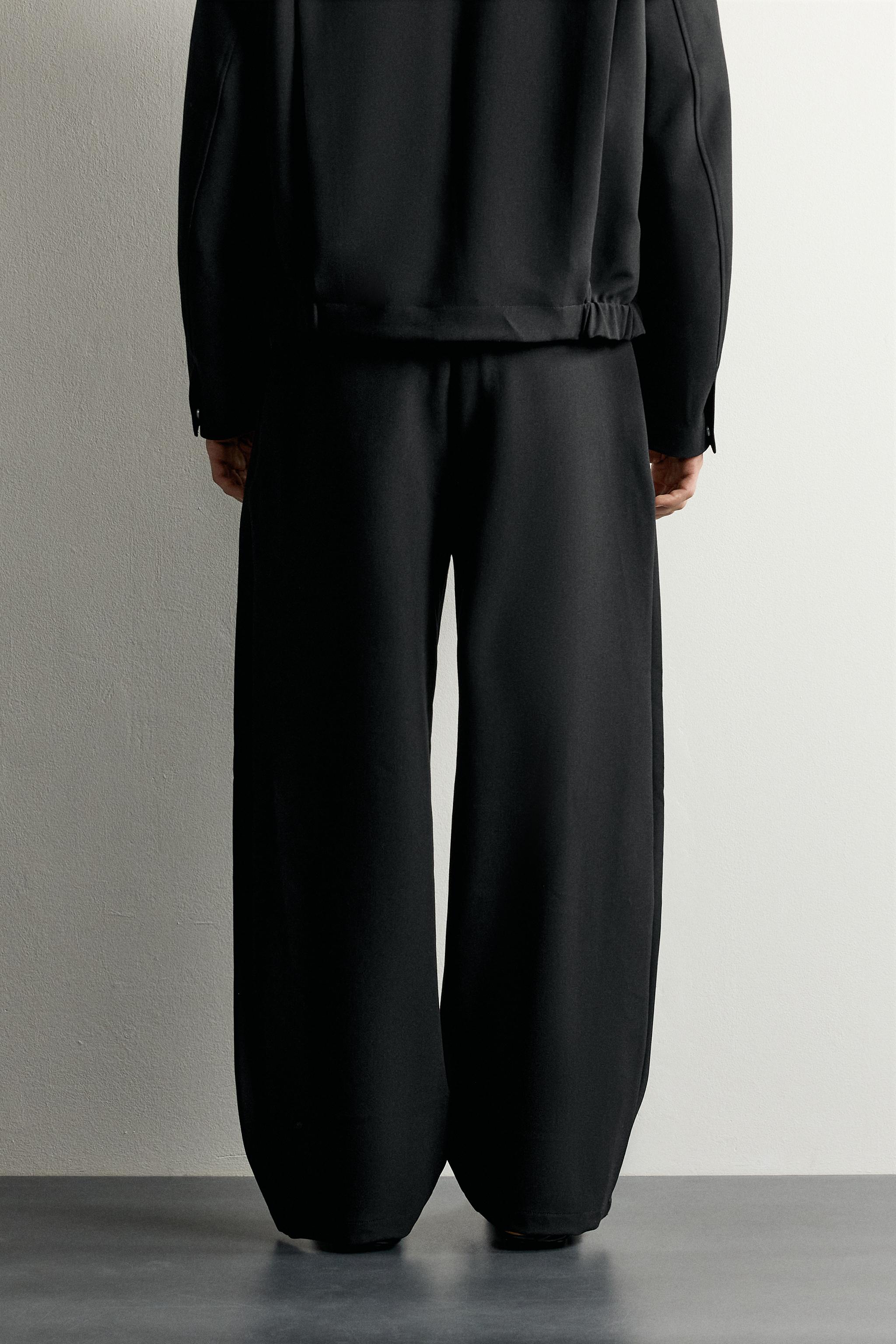 SIDE-PLEAT WIDE-FIT PANTS